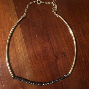 Cute gold/ black choker necklace. Adjustable !